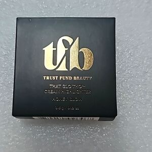 Trust Fund Beauty That Glo Tho cream highlighter in color "honey glow"